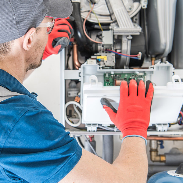 a man working on hvac equipment