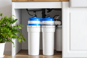 water softener system under kitchen sink cabinet