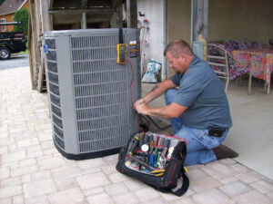 darryl barber working on an AC unit from Darryl Barber and Sons