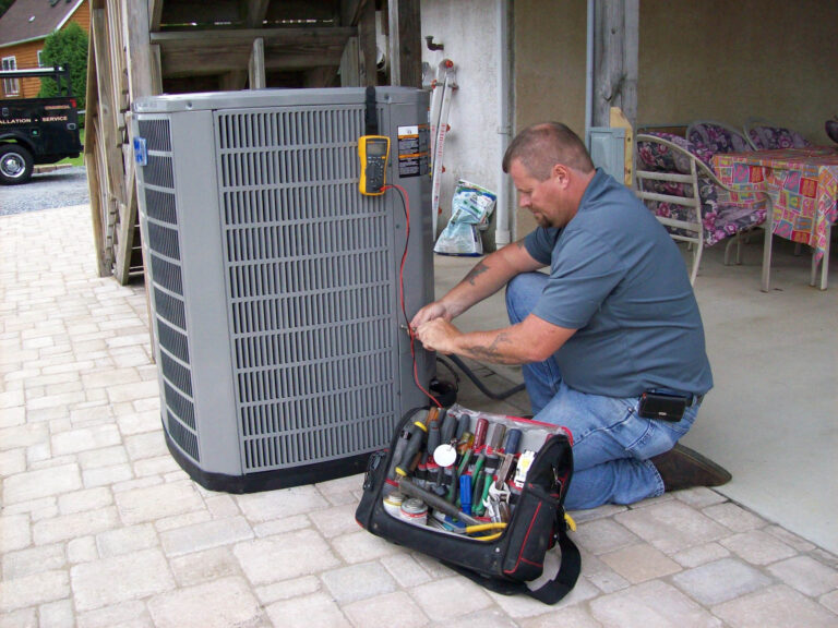 darryl barber working on an AC unit from Darryl Barber and Sons
